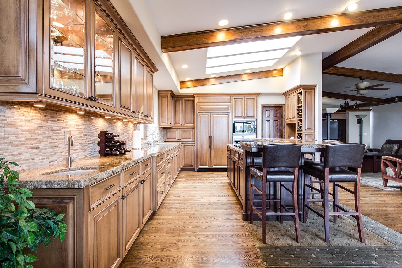 Bright kitchen with tile flooring and a central island